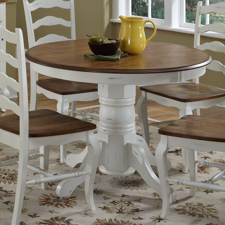 White and wood round shop dining table